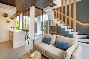 Deluxe Villa, 2 Bedrooms, Balcony, Pool View | Living area | 43-inch Smart TV with digital channels, Netflix, streaming services