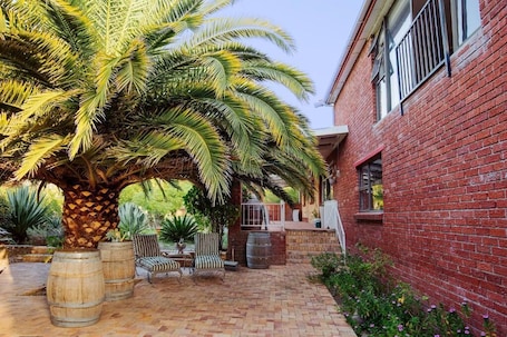 Terrace/patio. Staymore Guesthouse