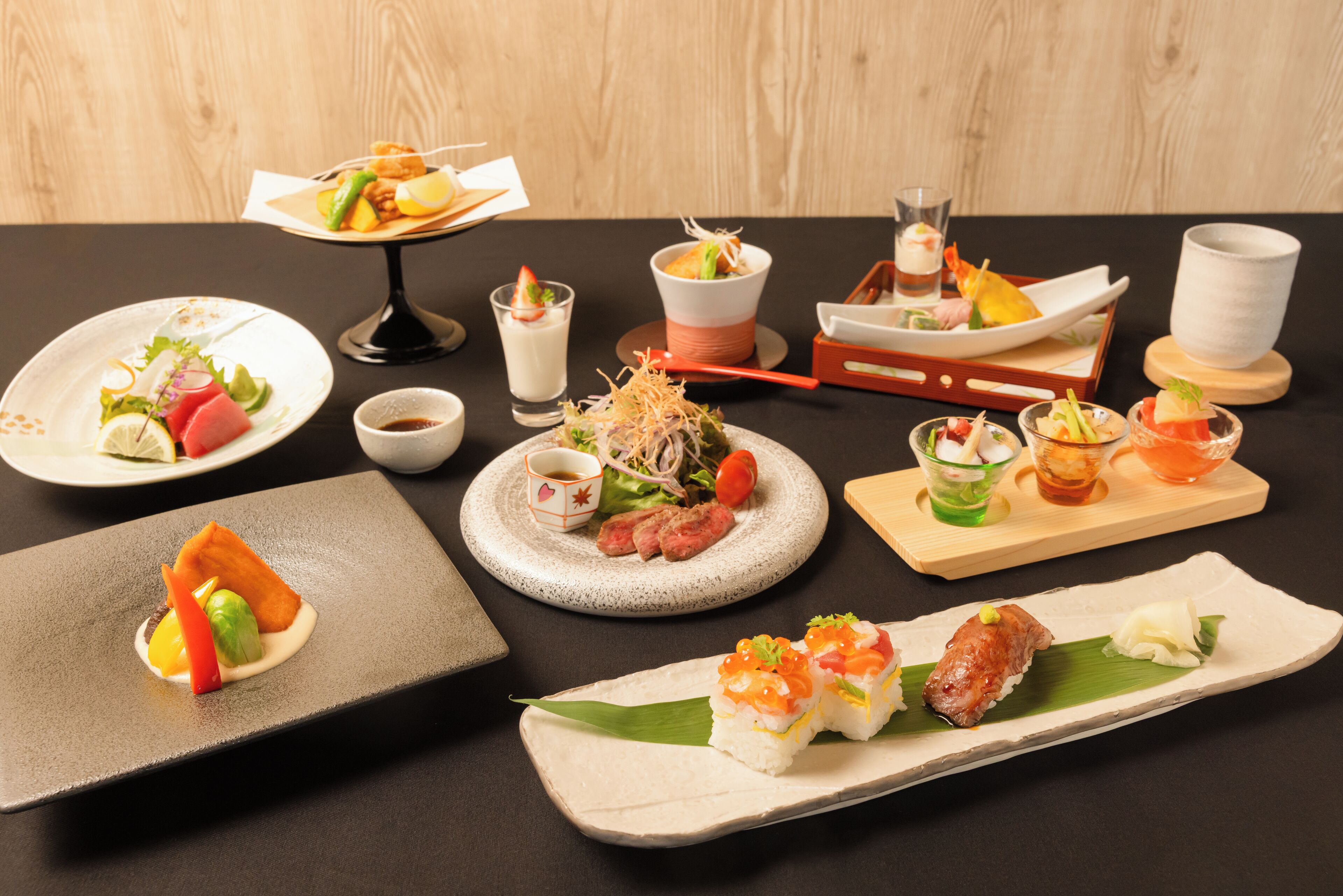 A variety of Japanese dishes arranged on a table.