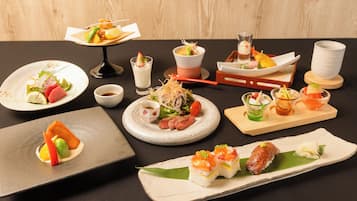 A variety of Japanese dishes arranged on a table.