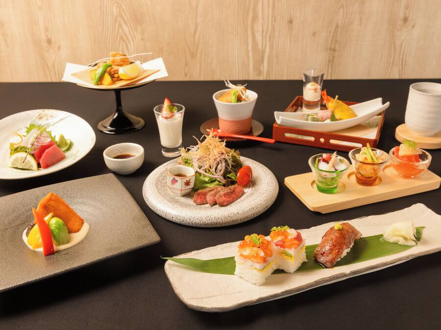 A variety of Japanese dishes arranged on a table.