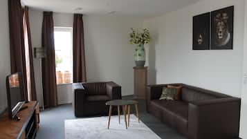 40-inch flat-screen TV with cable channels