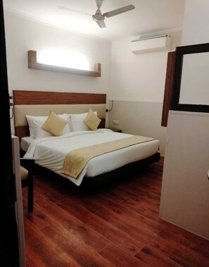 Desk, blackout drapes, soundproofing, iron/ironing board