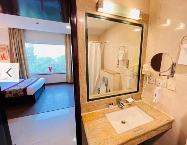 Hair dryer, slippers, towels, soap