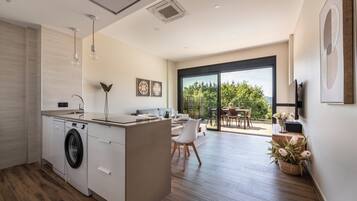 Apartment, 2 Bedrooms, Sea View, Tower | Private kitchen | Full-size fridge, microwave, stovetop, dishwasher