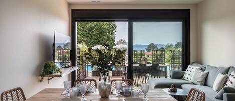 Apartment, 3 Bedrooms, Air conditioning, Oceanfront | Living area | 40-inch Smart TV with digital channels