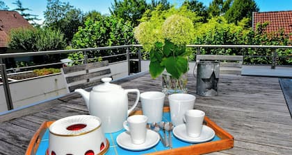 Ferienhaus 'Kunterbunt' mit privater Terrasse, Gemeinschaftsgarten und Wi-Fi