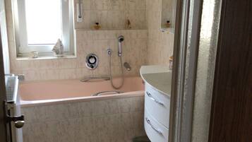 Shower, hair dryer, towels