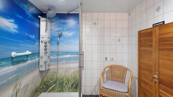 Shower, hair dryer, towels