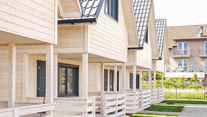 A row of modern, light-colored buildings with balconies and large windows. - 2 bedroom amazing home in Dziwnówek (Dziwnówek)
