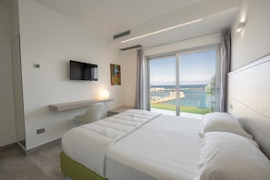 Deluxe Apartment, Sea View | 2 bedrooms, in-room safe, soundproofing, iron/ironing board