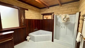 Shower, jetted tub, towels