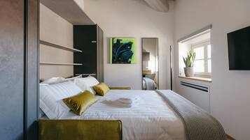 Junior Suite | 1 bedroom, in-room safe, desk, free WiFi