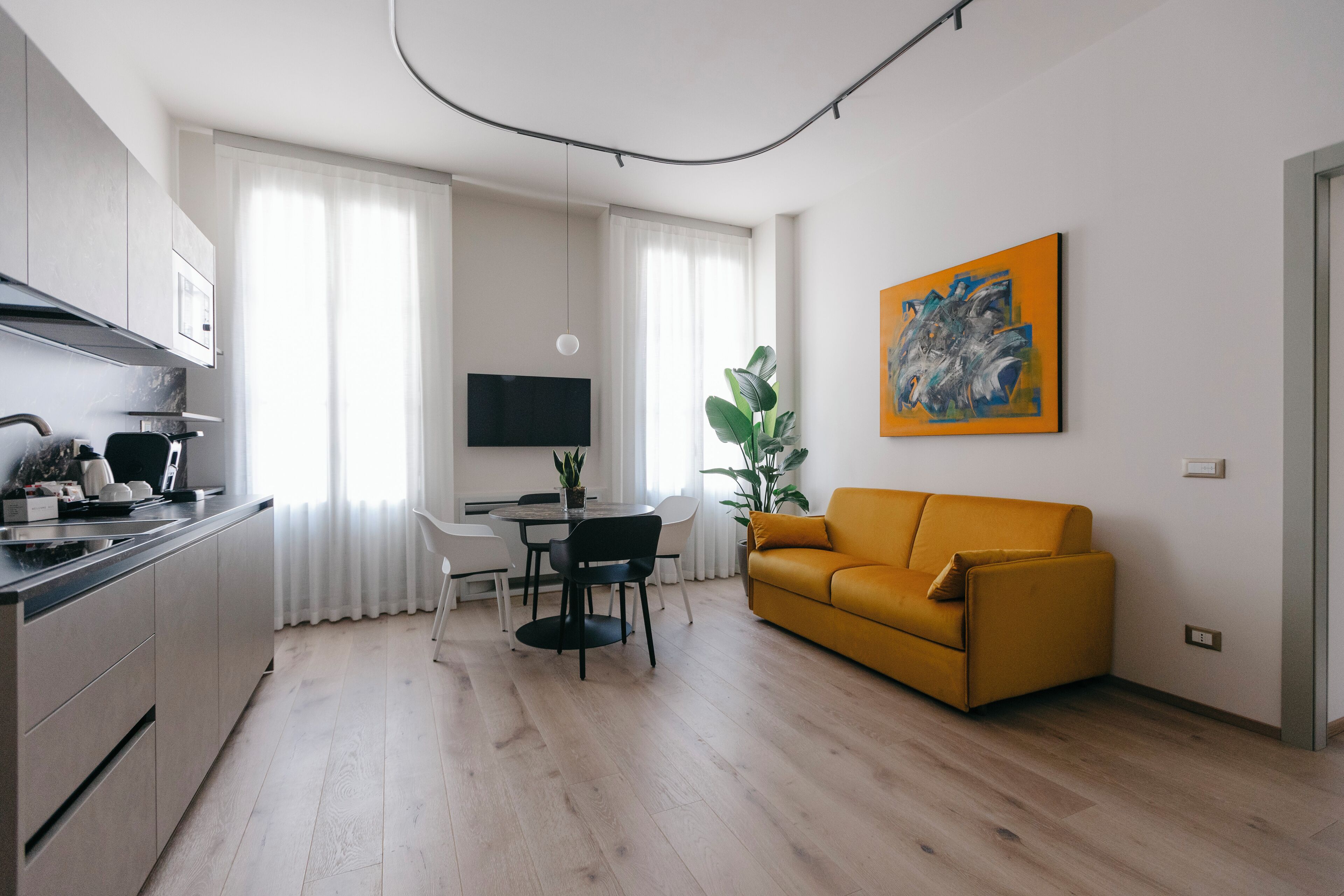 Deluxe Suite | Private kitchen | Fridge, microwave, stovetop, dishwasher