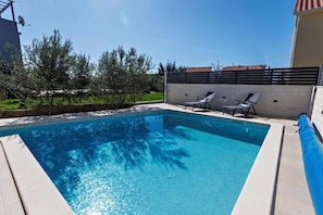 Piscina externa, piscina aquecida