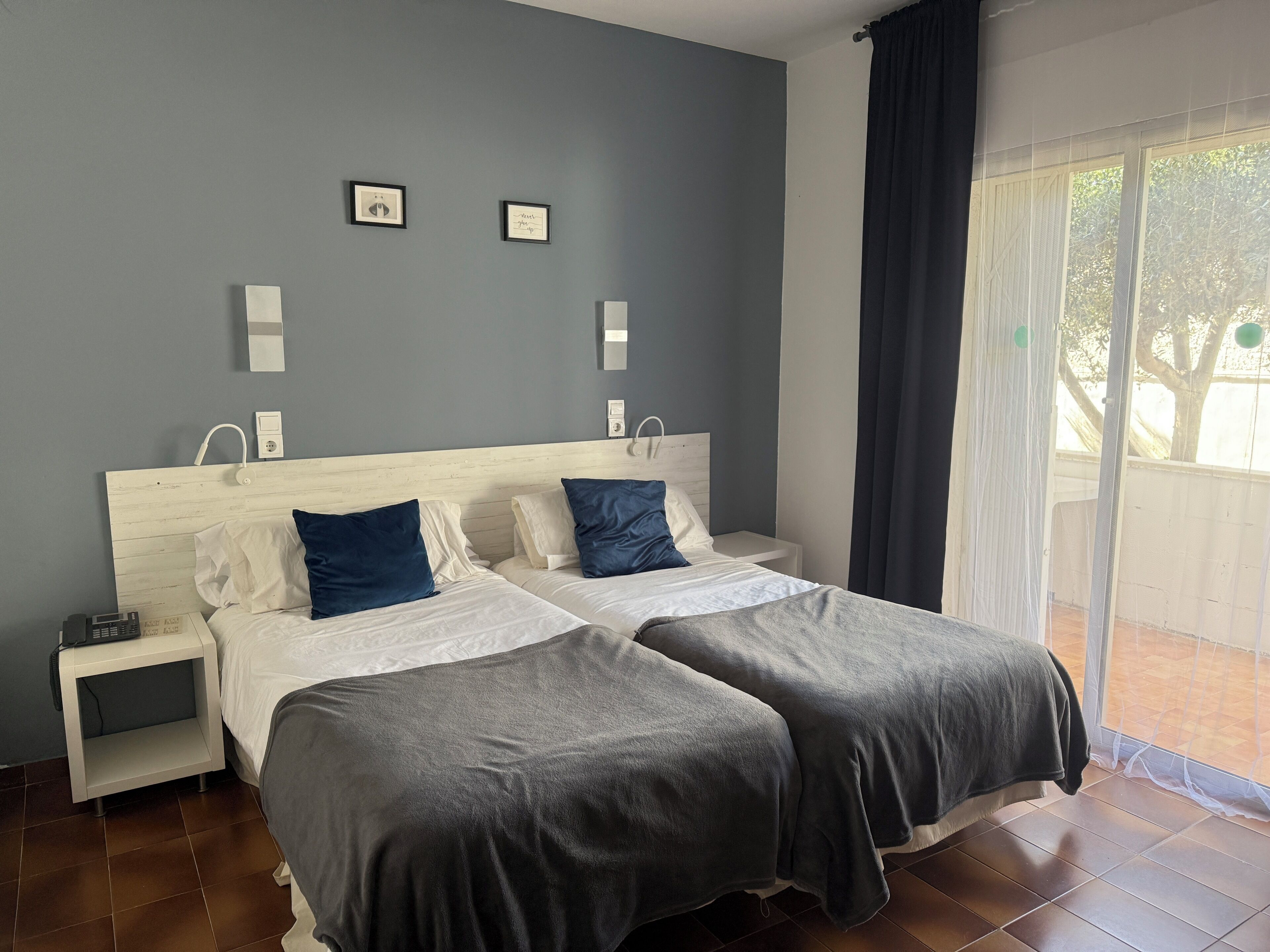 Standard Double Room, Balcony, Garden View | Down comforters, in-room safe, desk, laptop workspace