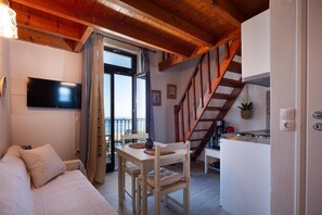 Comfort Apartment, Balcony, Beach View | Living area | Flat-screen TV - Fortezza Sea Breeze Eve-1BR & Sea View (Rethymno)