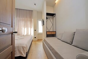 Superior Double Room, Courtyard View | Down comforters, memory foam beds, blackout drapes, soundproofing - The Place Gallia (Rome)