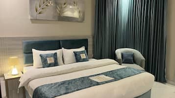 Appartement Junior | Coffre-fort pour ordinateur portable, système d’insonorisation