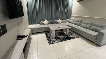 Junior Apartment | Living area | TV