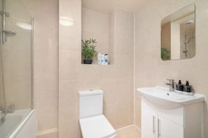 Hair dryer, towels, soap, toilet paper