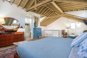 1 habitación, tabla de planchar con plancha y cuna de viaje 