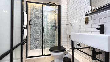 Shower, eco-friendly toiletries, hair dryer, towels