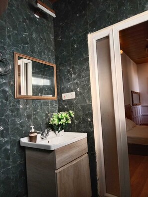 Double Room, Balcony, Mountain View | Bathroom | Shower, free toiletries, towels, soap - The Offroad Homestay (Dehradun)