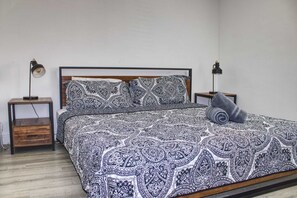 1 bedroom, desk, iron/ironing board, travel crib