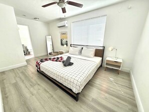 1 bedroom, desk, iron/ironing board, travel crib