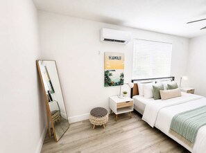 1 bedroom, desk, iron/ironing board, travel crib