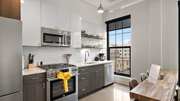 Deluxe Apartment, 2 Bedrooms, Non Smoking | Private kitchen | Fridge, microwave, coffee/tea maker, toaster