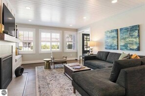 TV, fireplace, books, offices