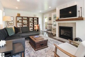 TV, fireplace, books, offices