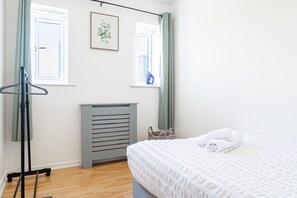 Departamento | 3 habitaciones, tabla de planchar con plancha y wifi gratis 