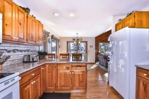 Fridge, microwave, oven, stovetop - Stepaway Vacation Rentals-Sweet Verna (Arbor Vitae)