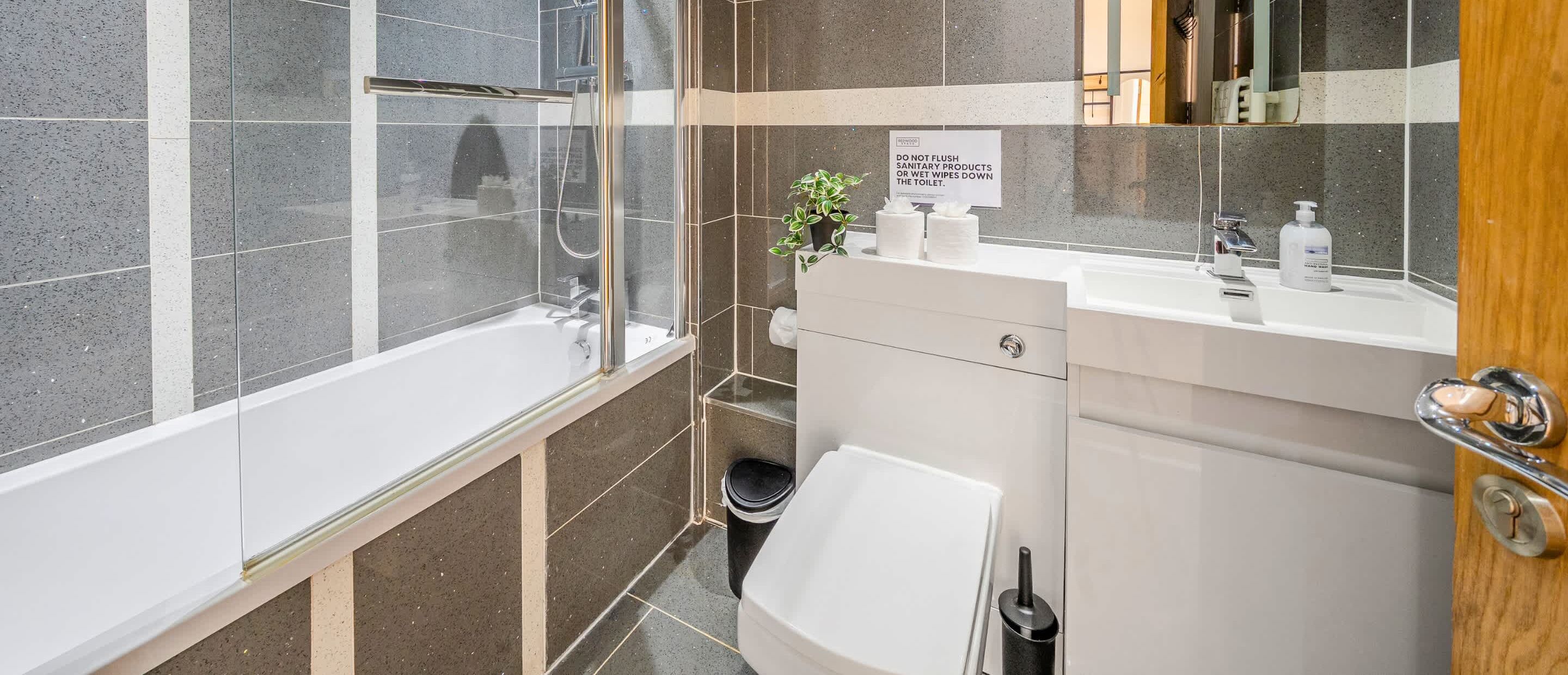 Shower, hair dryer, towels, shampoo