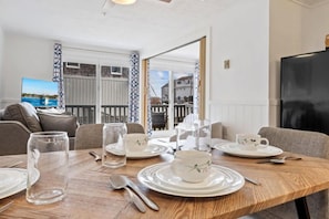 Condo, 1 Queen Bed with Sofa bed, Balcony, Garden View (Serenity by the Sea) | Dining