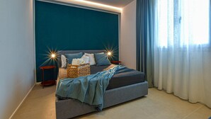 A modern bedroom with a bed, bedside tables, and a large window with curtains. - 3 bedroom lovely apartment in Trappeto (Trappeto)