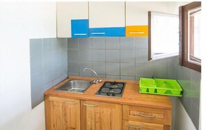Fridge, stovetop, coffee/tea maker, cookware/dishes/utensils