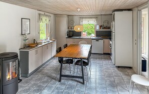 Fridge, stovetop, dishwasher, coffee/tea maker