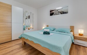 1 quarto, Wi-Fi de cortesia, roupa de cama