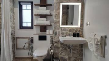 Eco-friendly toiletries, hair dryer, towels, soap