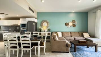 Basic Villa | Living area | 55-inch Smart TV with cable channels