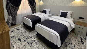 Classic Twin Room, City View | In-room safe, desk, laptop workspace, soundproofing