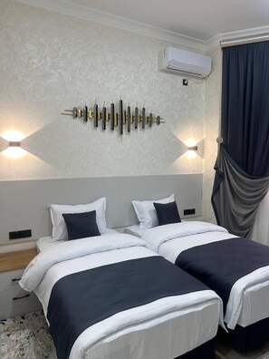 Classic Twin Room, City View | In-room safe, desk, laptop workspace, soundproofing - Nifal Guest House (Samarkand)