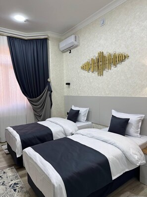 Classic Twin Room, City View | In-room safe, desk, laptop workspace, soundproofing - Nifal Guest House (Samarkand)