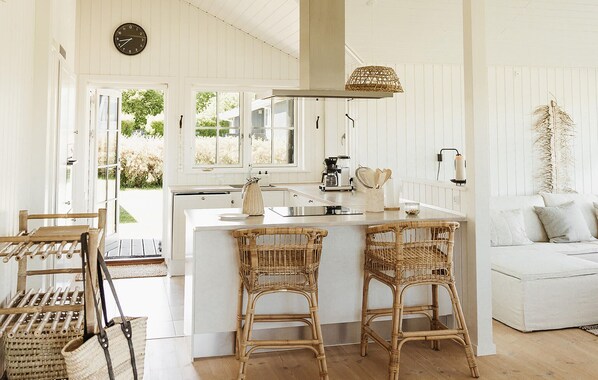 Fridge, stovetop, dishwasher, coffee/tea maker