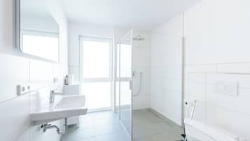Shower, rainfall showerhead, hair dryer, towels