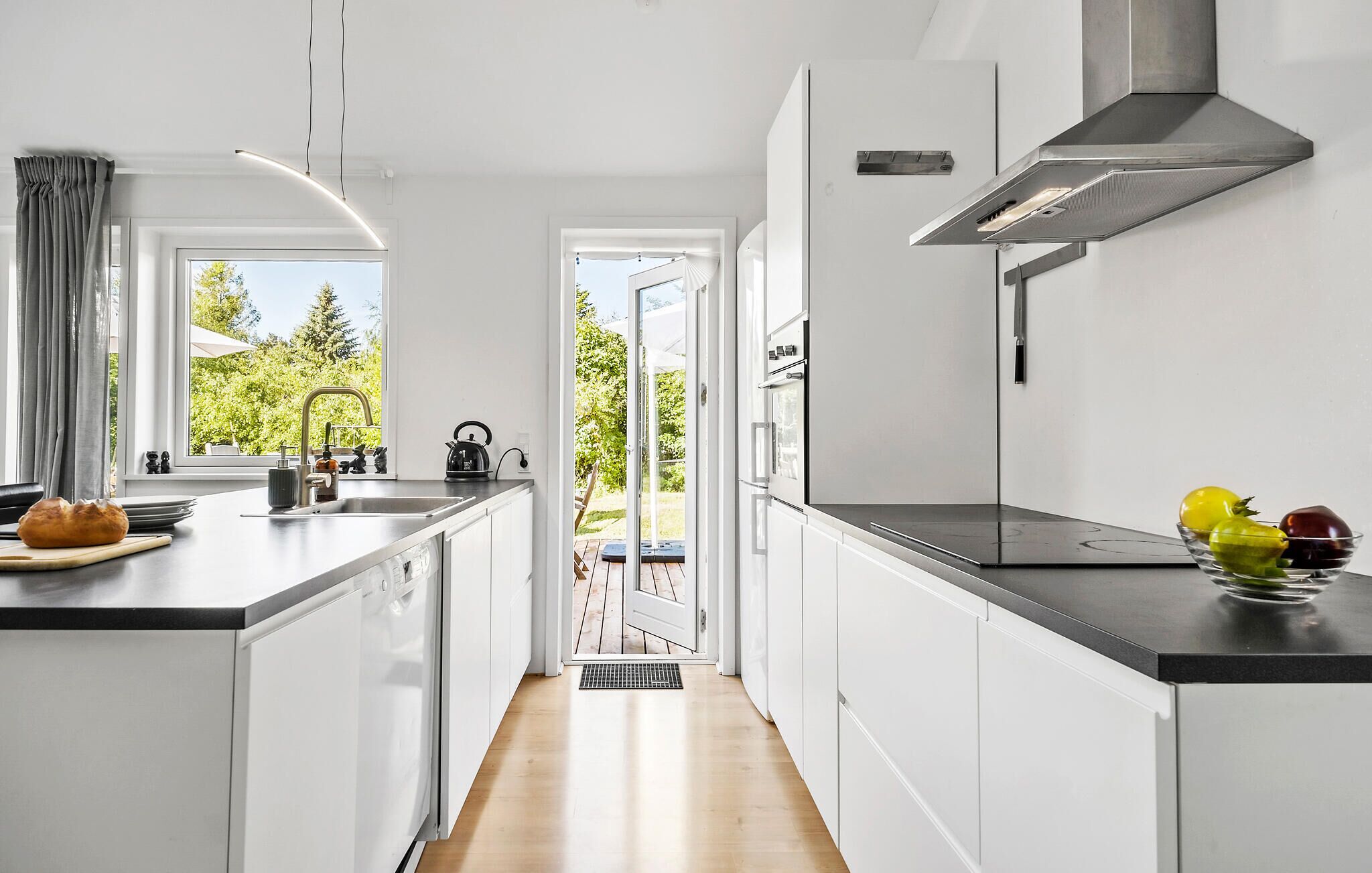 Fridge, stovetop, dishwasher, coffee/tea maker